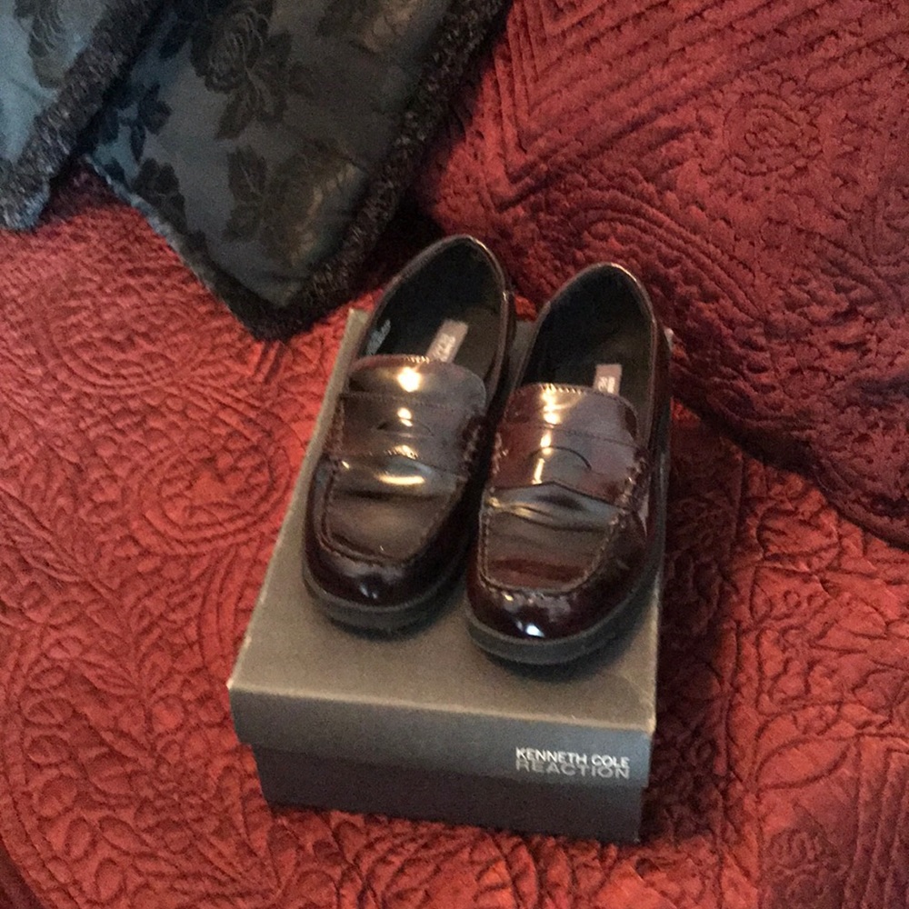 KENNETH COLE Boy’s penny loafers.